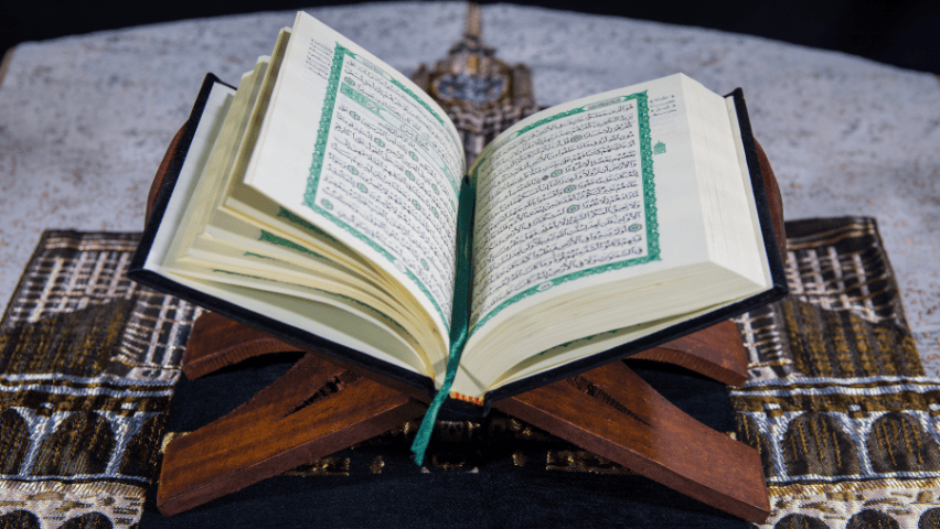 Holy Quran placed on a wooden stand
